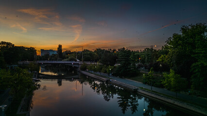 Fototapeta premium Sunset over the Bega River, Romania, Timisoara.