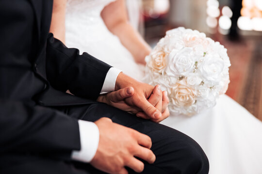 Hands,  picture of man and woman with wedding ring, church wedding  ceremony,love
