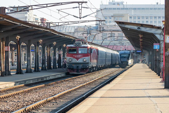 Train in motion or at train platform at North Rail station (Gara de Nord). Train transport infrastructure. Bucharest, Romania, 2023
