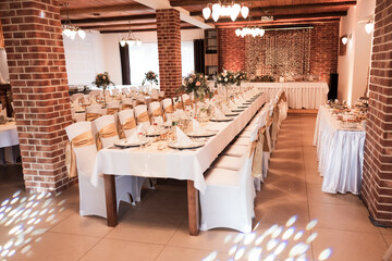 wedding table with decorations,flowers and food