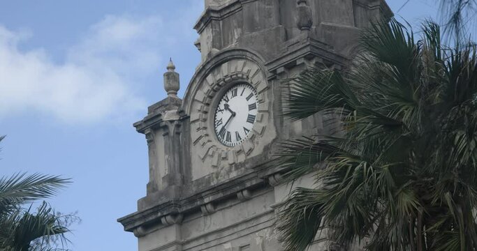 Antigua Caribbean St Johns Cathedral clock tower palm close. Church of Diocese North Eastern Caribbean and Aruba. Anglican Church of England. Originally built 1683. Seventy foot twin towers.