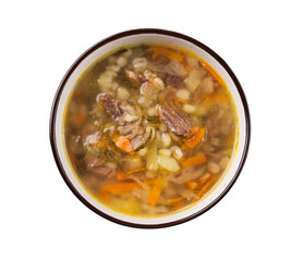 Traditional Russian soup with pickled cucumbers. Pickle with pearl barley and meat on a white isolated background.