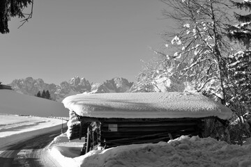 Old wooden cabin in the snow