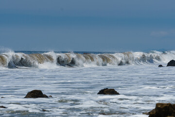 El Matador Beach along the East Pacific Coast Highway in Malibu California. The beach is a collection cliff-foot beaches and bluff top view of the eroding formations, sea stacks, caves and arches. 