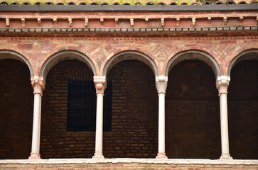 Detail of arches in building in Bologna