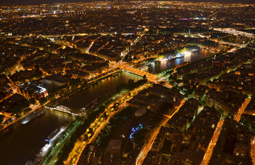 Fototapeta na wymiar Aerial view of Paris at night from the Eiffel Tower