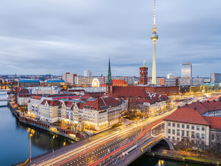 Fototapeta na wymiar Aerial long exposure shot of Berlin city after sunset, Germany