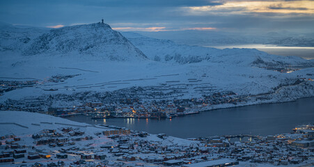 View from mountains to the city during the polar nights