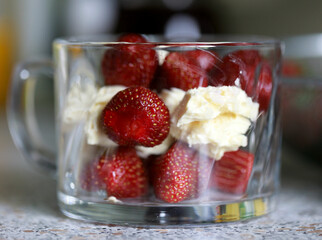 Strawberry and cream cheese summer cake on white marble board. Homemade summer dessert in spring decoration. brunch ideas. easter dessert.