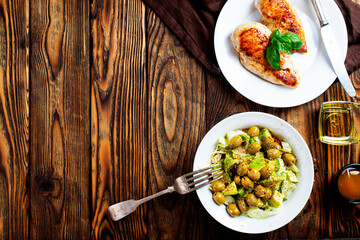 grilled chicken breast and fresh salad