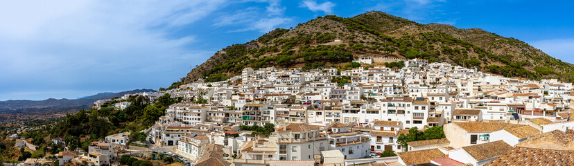 Fototapeta na wymiar Panoramic view of white houses in Mijas, Spain on October 2, 2022