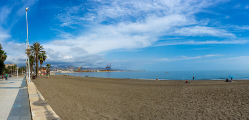Panoramic view of promenade beach and port in Malaga, Spain on October 10, 2022