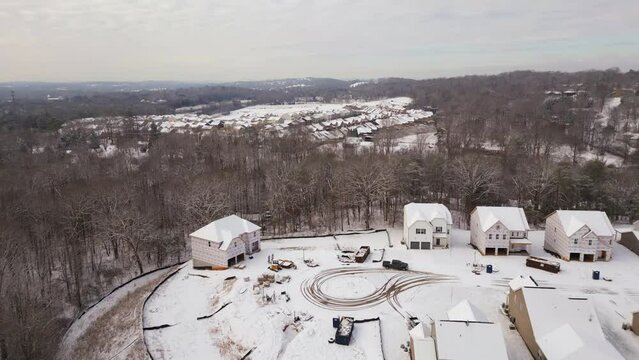 Aerial shot of snow covered small town in Knoxville, Tennessee in the winter.