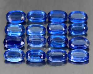 Natural beautiful gemstone kyanite on gray background