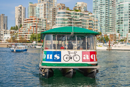 An aquabus or water taxi plying the waters of False Creek from Granville Island in downtown Vancouver, Canada.