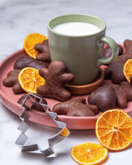 Gingerbread cookies and milk for Santa. Christmas composition with Gingerbread cookies and milk. Christmas and holiday concept.