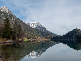 Fototapeta na wymiar Reflection in lake, nobody. Nice day at the Hintersteiner See, Austria. 