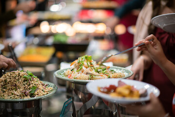 scooping the food, catering, dinner time