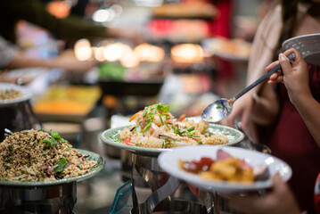 scooping the food, catering, dinner time