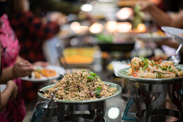 scooping the food, catering, dinner time