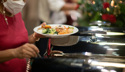 scooping the food, catering, dinner time