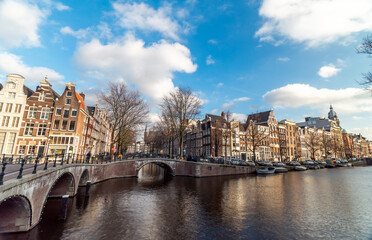 Fototapeta premium Amsterdam canal in sunny day, Amsterdam is the capital and most populous city in Netherlands.