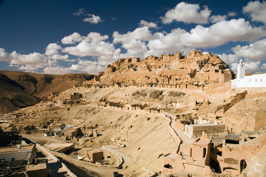 Homes built into the mountainside at Chenini, a ruined Berber mountain village.