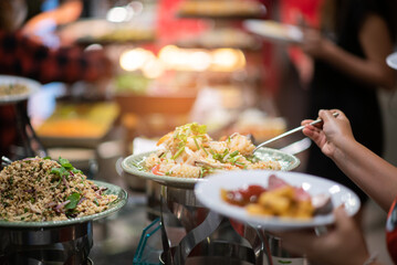 scooping the food, catering, dinner time