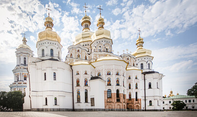 Fototapeta na wymiar Kyiv Pechersk Lavra, Holy Dormition cathedral. Main temple of Kyiv Monastery of Caves, Ukraine. Rear view, with old authentic masonry UNESCO World Heritage Site