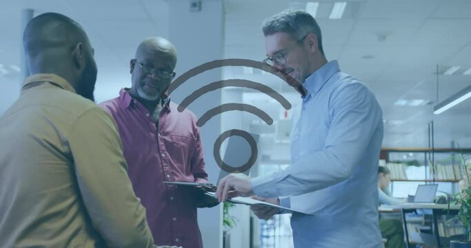 Animation of wifi icon and data processing over diverse business people in office
