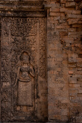 Fototapeta na wymiar Apsara sculpture at Angkor wall, Cambodia