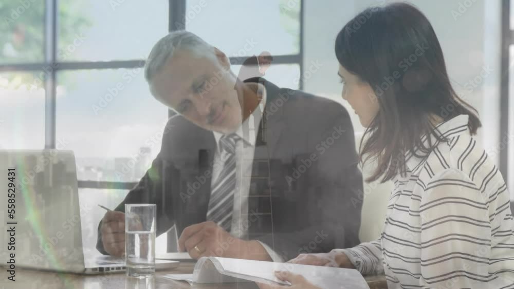 Canvas Prints Animation of cityscape over diverse business people working at office