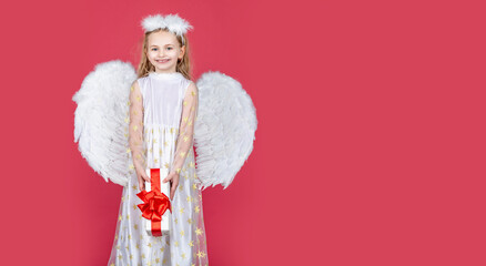 Angel child banner, isolated studio background. Angel child from heaven gives you gift. Cute...