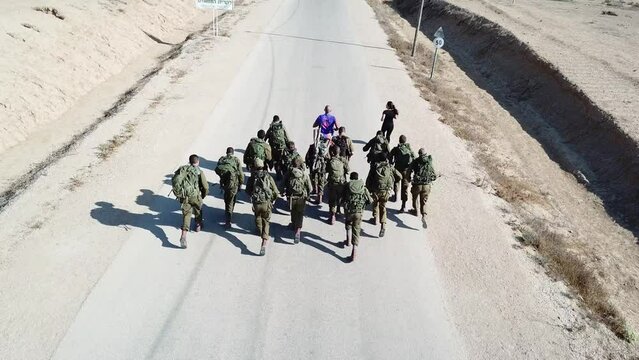 A number of First Army soldiers ran under the guidance of their trainers