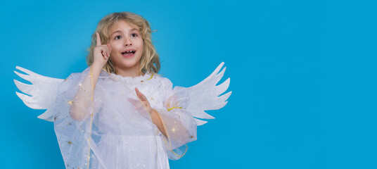 Child angel pointing up, point gesture. Valentines day. Little cupid angel child with wings. Banner for website header design.