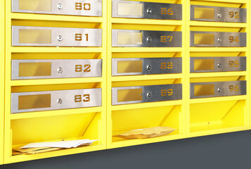Metal mailboxes with keyholes, numbers and correspondence in post office
