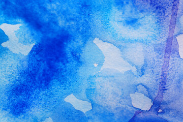 Fototapeta na wymiar Abstract blue watercolor painting as background, top view