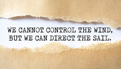Inspirational motivational quote. We cannot control the wind, but we can direct the sail.
