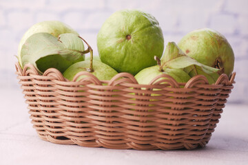 close up of slice of guava on table 
