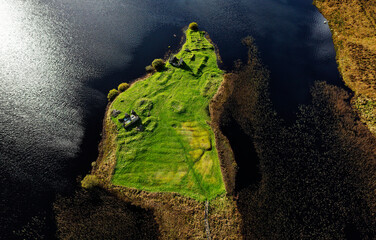 Finlaggan historic site on island of Eilean Mor in Loch Finlaggan, Islay, Inner Hebrides, Scotland. Seat of the Lords of the Isles and of Clan Donald © David Matthew Lyons
