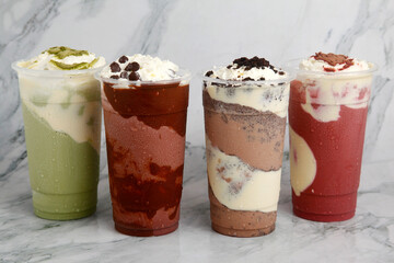 Group of freshly made flavored frappe and shake