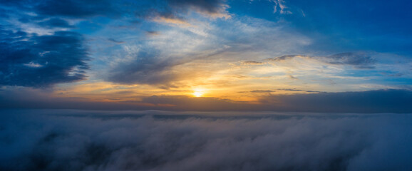 A wonderful dawn above the clouds. Natural background