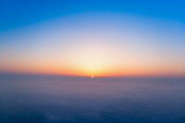 A wonderful dawn above the clouds. Natural background