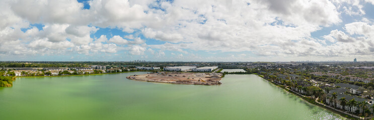 Manmade lake in warehouse district Davie Florida