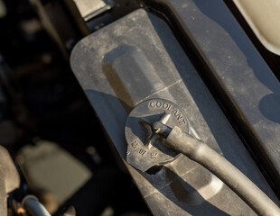 Car coolant water of radiator bottle in the engine bay