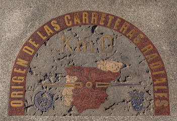 Zero kilometer brass plaque on Puerta del Sol square in Madrid, Spain
