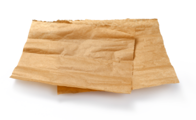Baking paper isolated. Crumpled pieces of brown parchment or baking paper on white background. Design element.