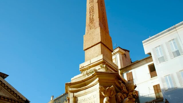 Establishing shot of the Piazza della Rotonda, the Obelisco Macuteo and the Pantheon in Rome, Italy. Built in the 2nd century AD, the Pantheon is a masterpiece temple of Ancient Rome