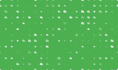 Seamless background pattern of evenly spaced white piece of cake symbols of different sizes and opacity. Vector illustration on green background with stars