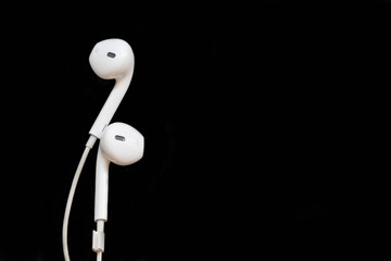 earphone connect listen mobile phone arrangement flat lay style on background black